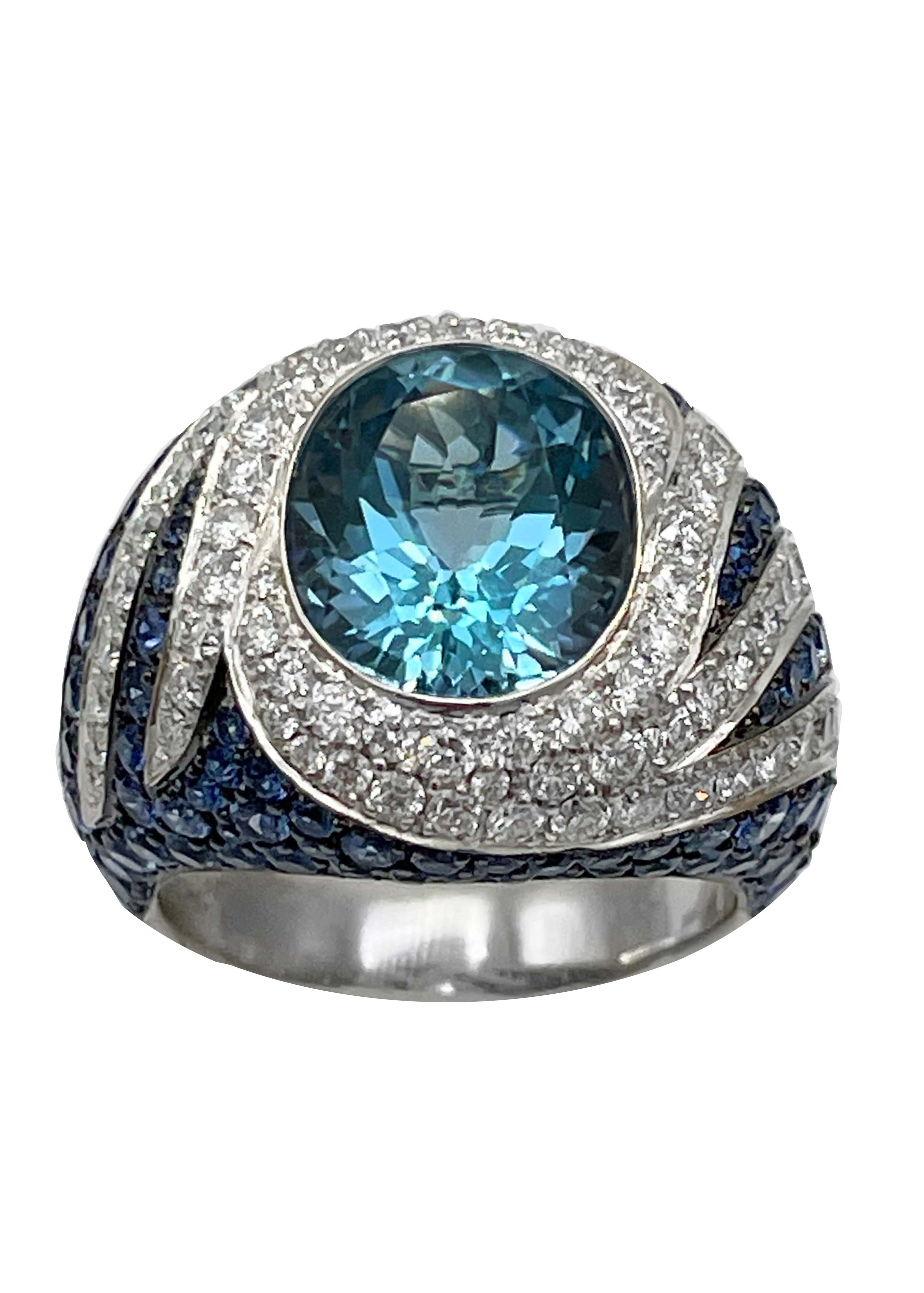 18k White Gold Blue Topaz, Diamonds and Sapphire Ring Image
